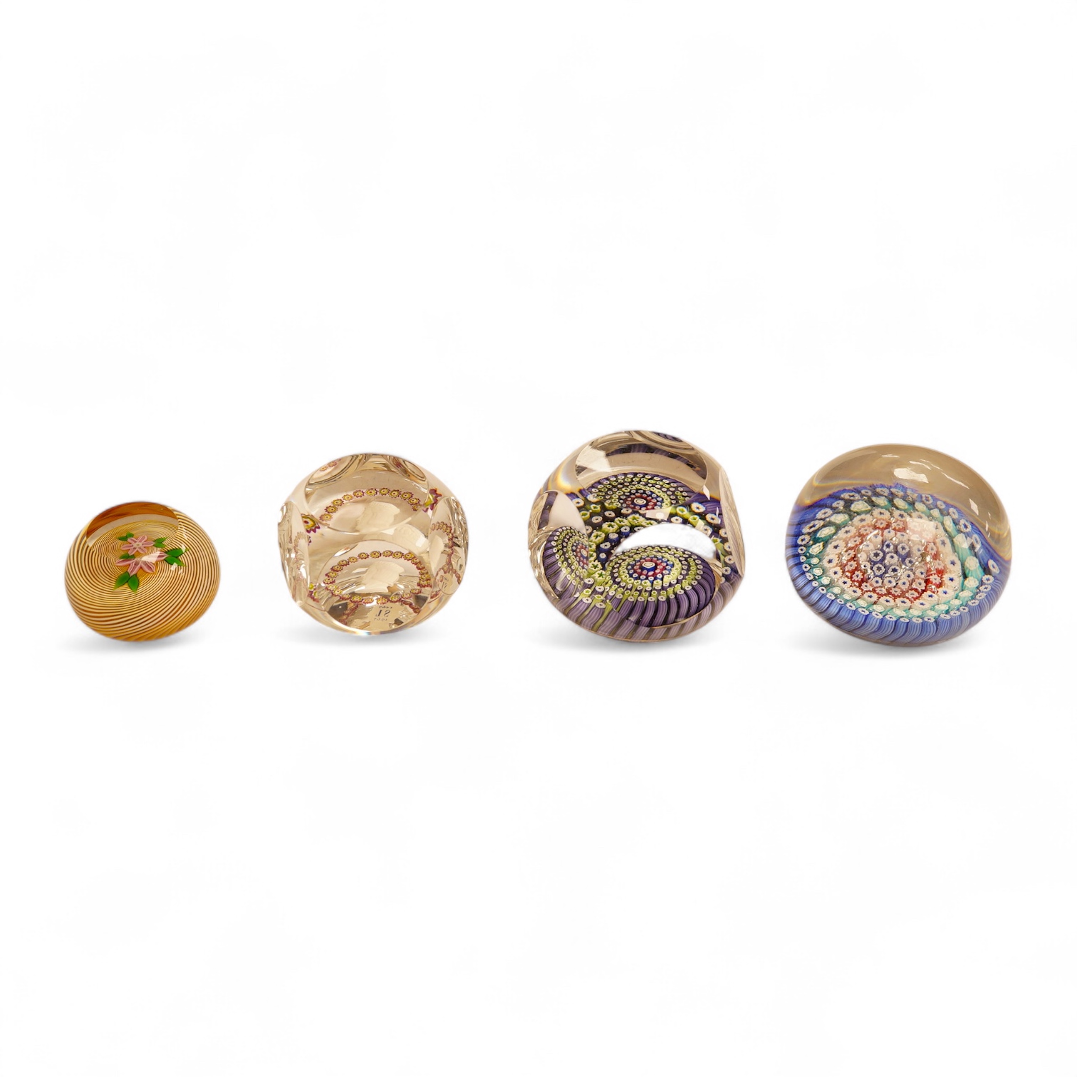 Three Whitefriars glass paperweights and a boxed St Louis sulphide paperweights, largest 7.5cm in diamter